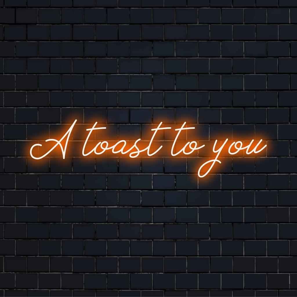 Placa de LED neon personalizada com a frase Um Brinde a Você em cores vibrantes, perfeita para dar um toque comemorativo a qualquer espaço.