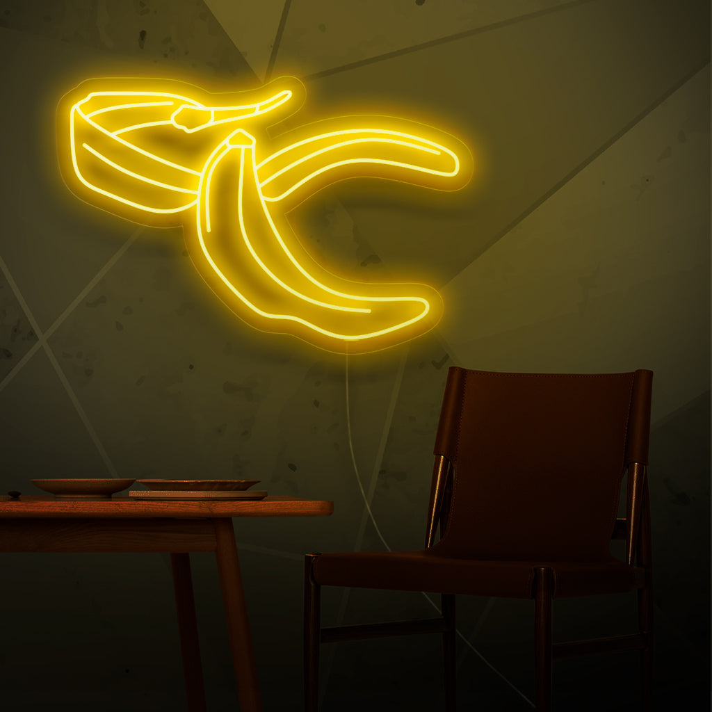 "Placa de neon em forma de casca de banana" - Uma luz neon peculiar com a representação divertida de uma casca de banana, trazendo humor e leveza ao seu ambiente.