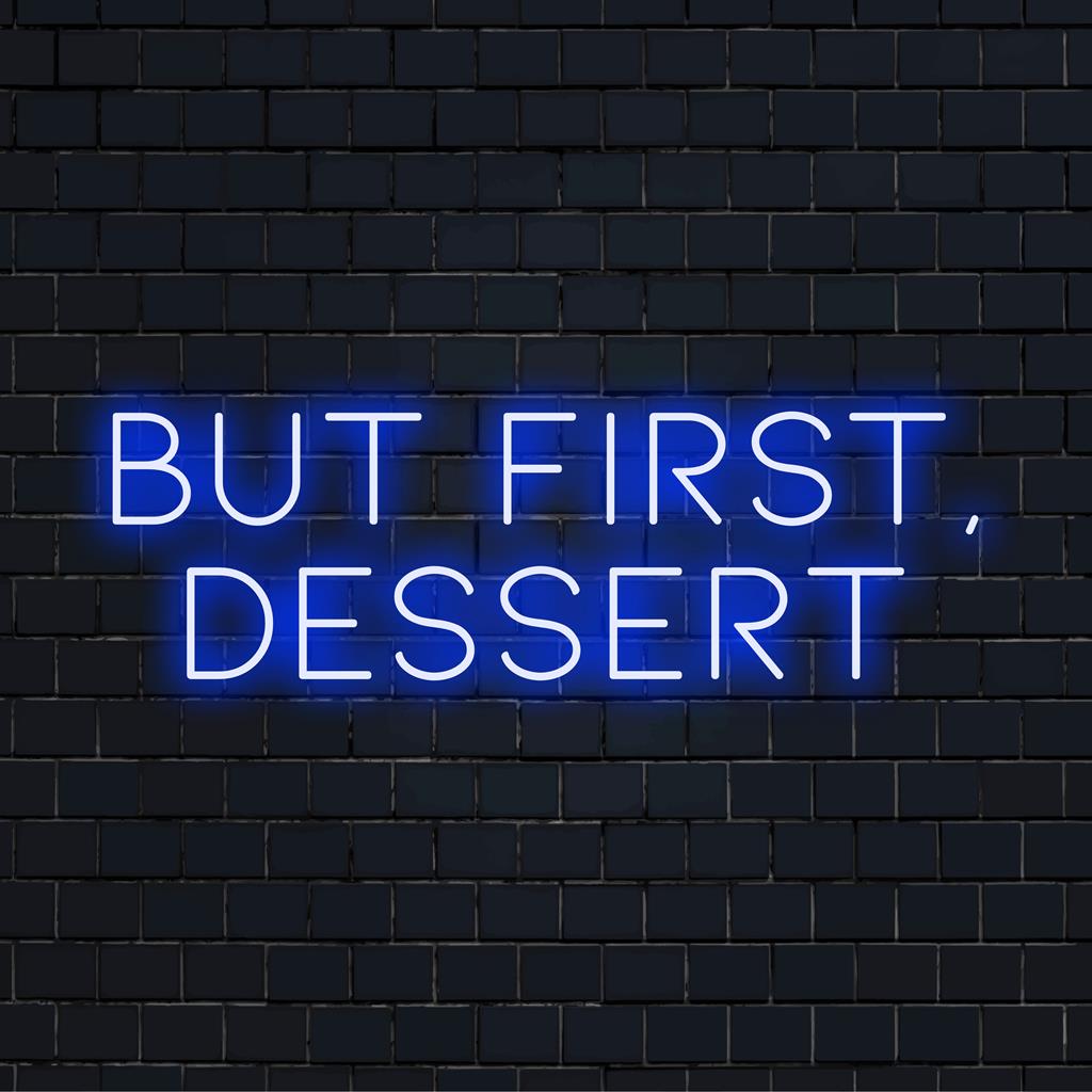Letreiro de neon LED com os dizeres "But First, Dessert" em rosa brilhante, uma mensagem divertida perfeita para ambientes onde se gosta de doces.