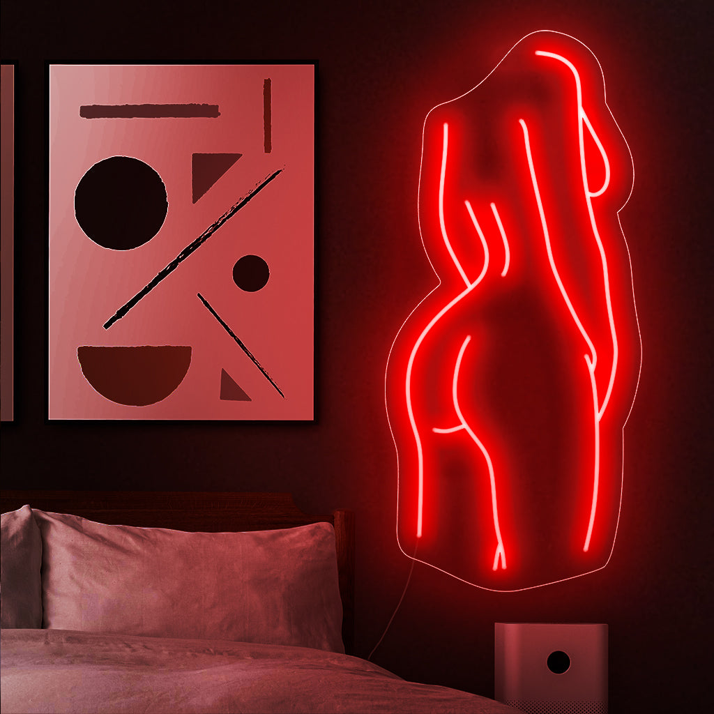 "Elegant Nude Body Neon Sign" serve como uma expressão estética, destacando a beleza e a graça da forma humana de uma perspectiva artística.