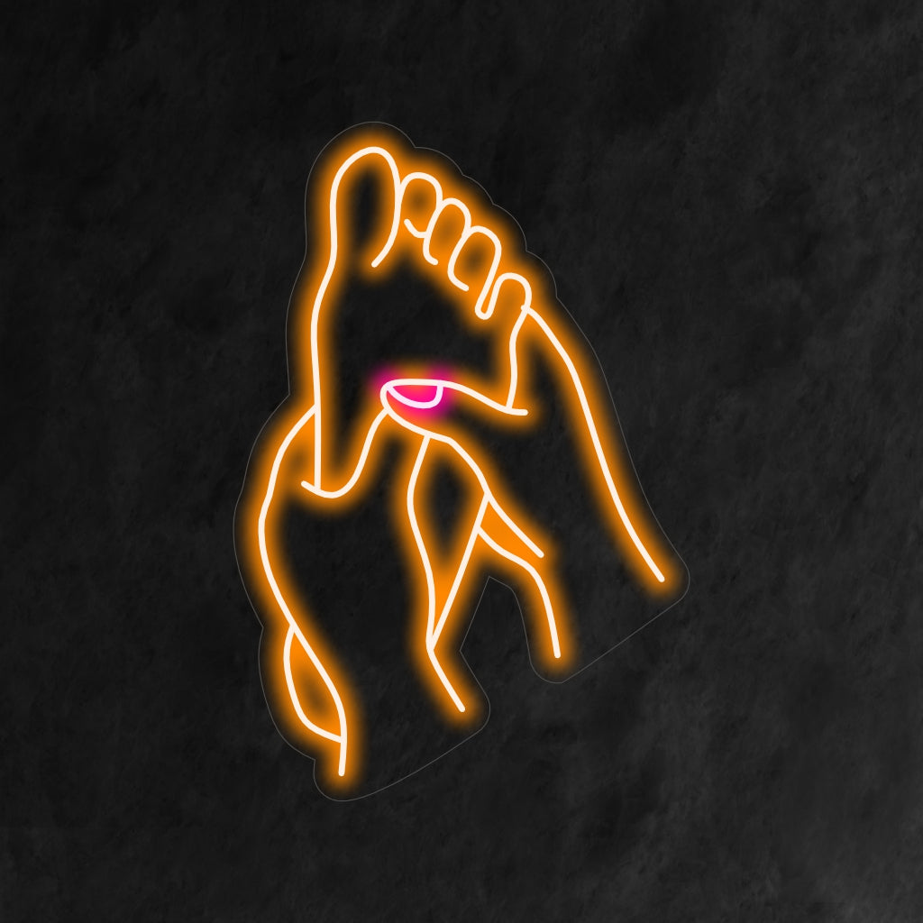 O letreiro de neon "Foot Massage" é uma adição relaxante e relaxante ao seu ambiente de bem-estar. Uma luz neon que convida você a relaxar e desfrutar de uma massagem nos pés.