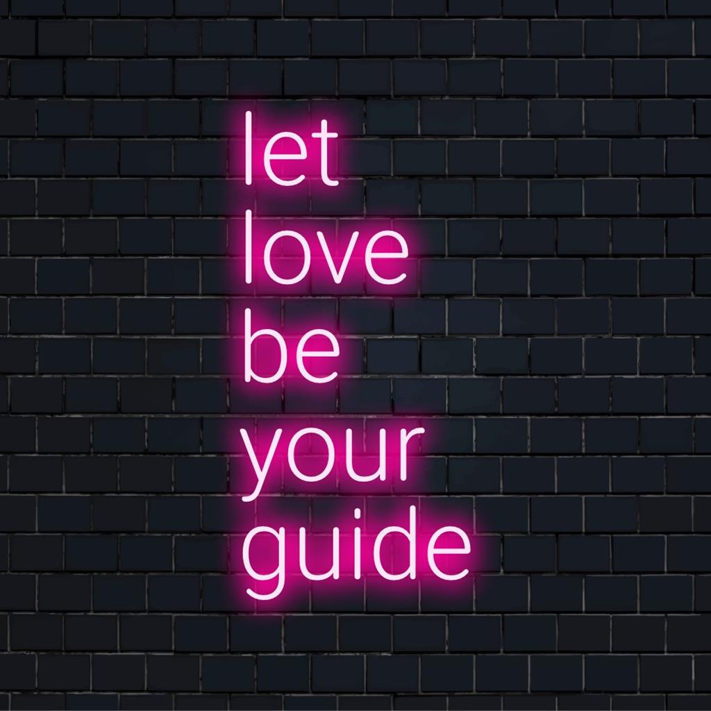 Letreiro de neon LED vibrante com os dizeres Let Love Be Your Guide, misturando arte e luz para iluminar espaços com energia positiva.