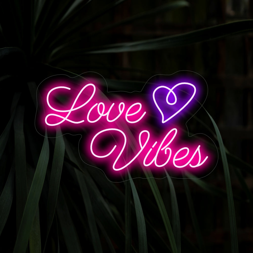 "Placa Neon Love Vibes" é um toque moderno e carinhoso para espaços que irradiam energia positiva e romântica. Ilumine com vibrações de amor!