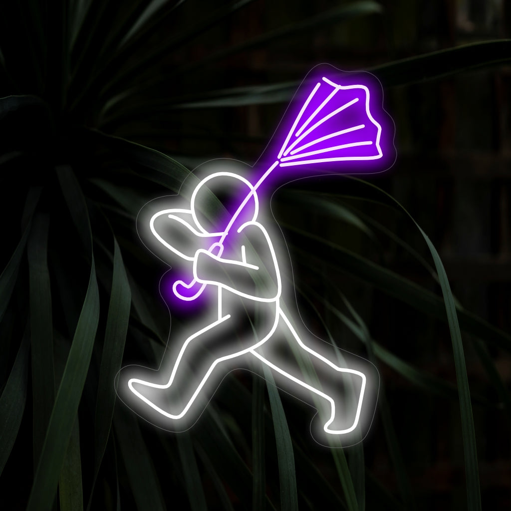"Homem Tenta Segurar Seu Guarda-chuva em Neon" é uma adição peculiar e bem-humorada para espaços com um toque de fantasia. Ilumine com uma atmosfera lúdica!