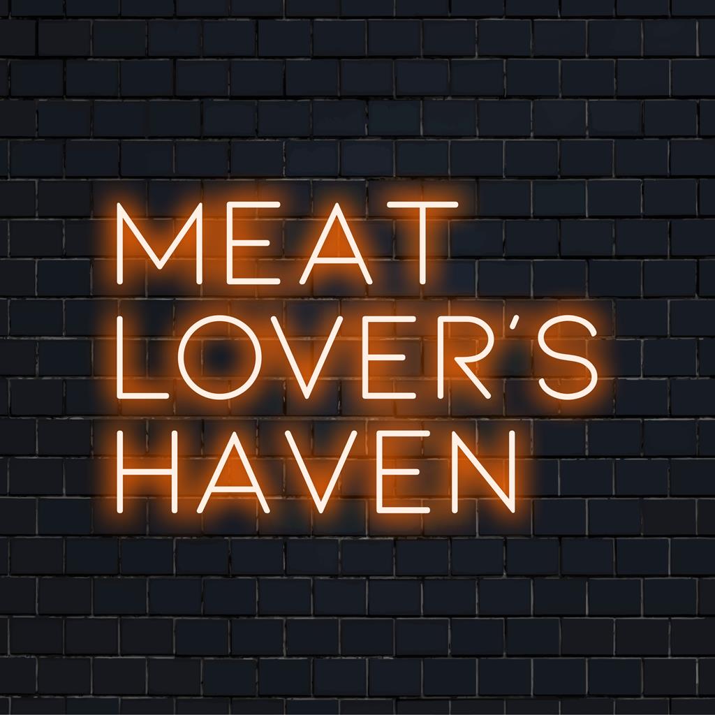 Placa de LED neon personalizada com os dizeres Meat Lover's Haven, combinando tons neon vibrantes para um impacto visual impressionante.