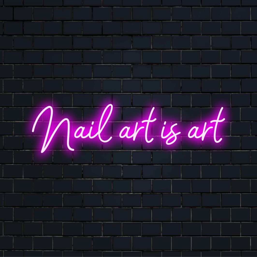 Letreiro de neon LED com os dizeres Nail Art Is Art, perfeito para salões; um brilho rosa marcante dá um toque especial a qualquer espaço de beleza.