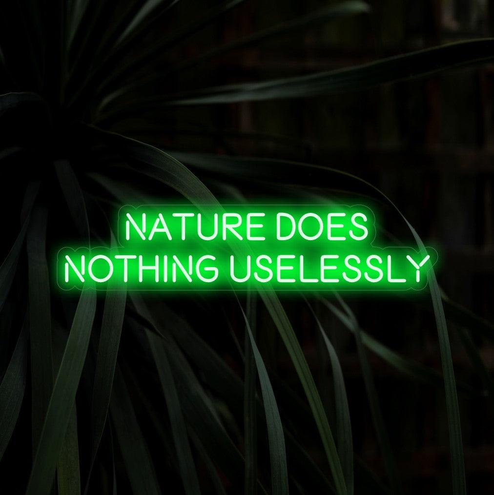 "A Natureza Não Faz Nada Inutilmente" é um letreiro de neon filosófico e contemplativo, perfeito para espaços que abraçam a sabedoria da natureza. Ilumine com pensamentos profundos!