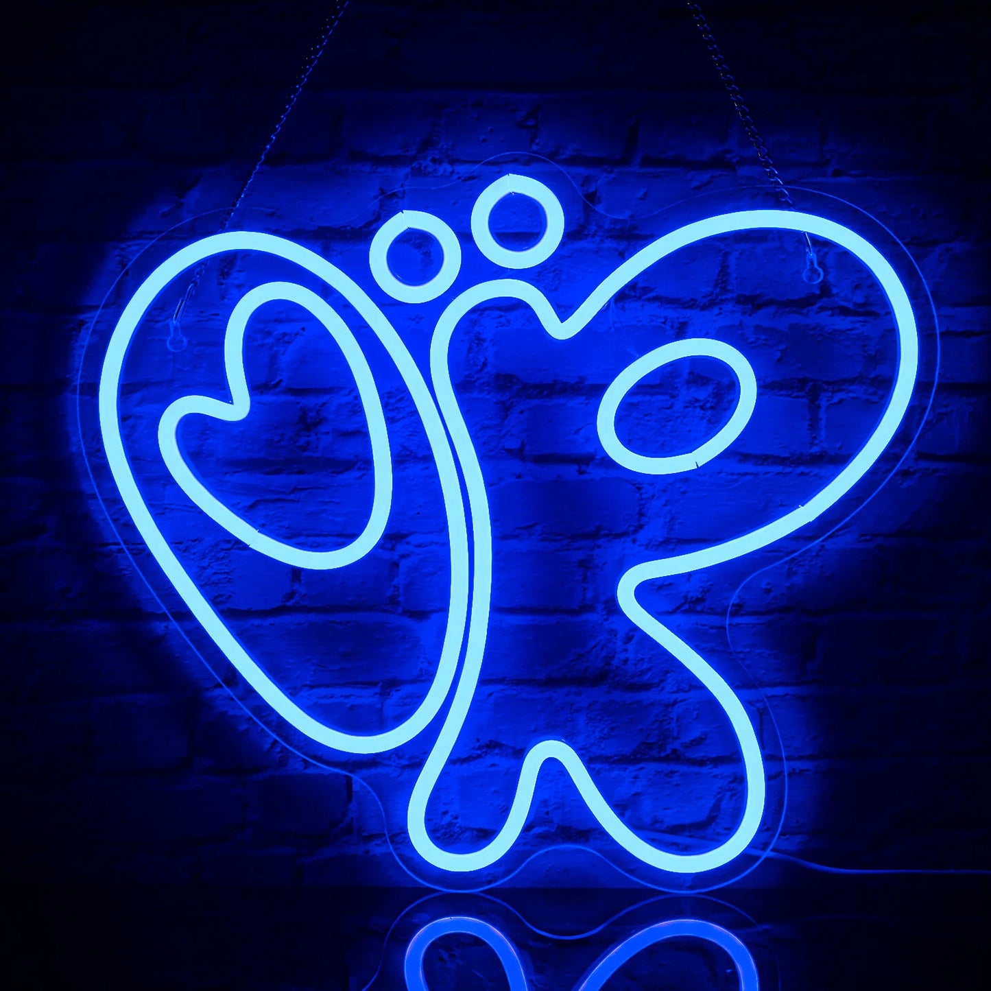 Uma vibrante placa de LED neon feita à mão representando um caracol estilizado com uma concha espiral.