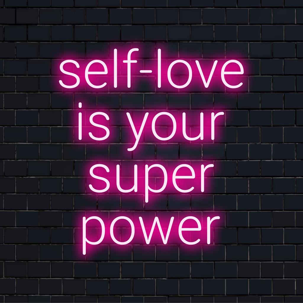 Placa de neon LED rosa radiante com os dizeres "O amor-próprio é seu superpoder", perfeita para uma decoração de parede vibrante e empoderadora.