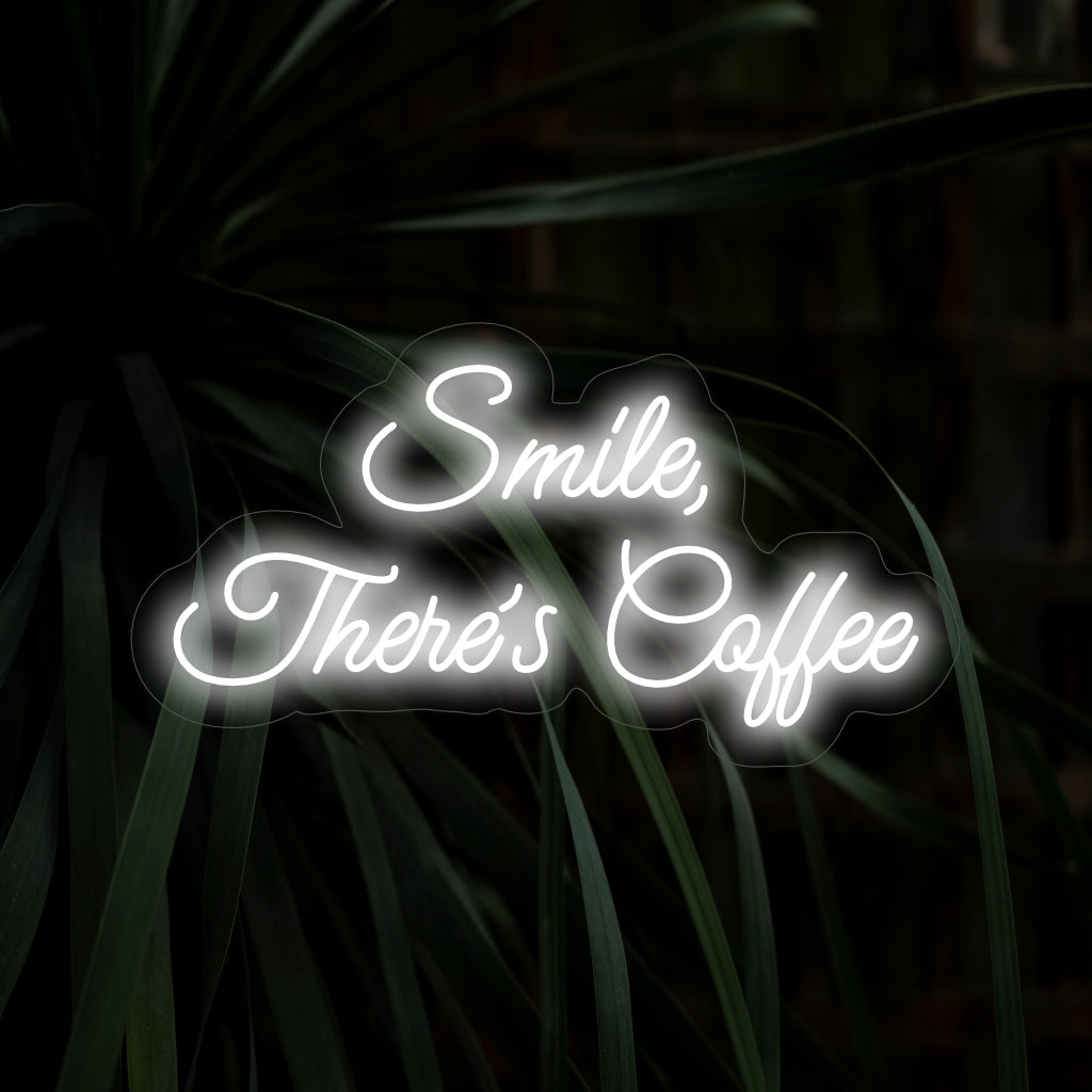 A placa de neon "Sorria, Tem Café" espalha alegria com sua mensagem inspiradora e design de xícara de café, lançando um brilho encantador para criar um ambiente positivo e acolhedor no seu espaço.