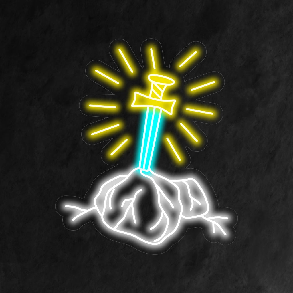 "Placa de Neon Espada na Pedra" é uma adição mítica e encantadora ao seu interior com tema de fantasia. Uma luz de neon que captura a imagem lendária de uma espada na pedra.
