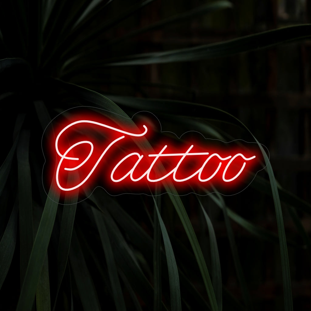 "Tattoo Neon Sign" acrescenta uma arte vibrante com seu design icônico, lançando um brilho ousado que celebra a criatividade e a beleza das tatuagens em seu espaço.