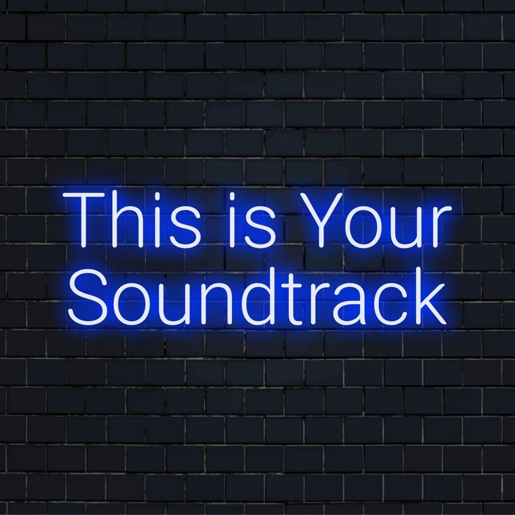 Uma vibrante placa de neon LED com a frase This Is Your Soundtrack, perfeita como arte de parede neon personalizada ou decoração.