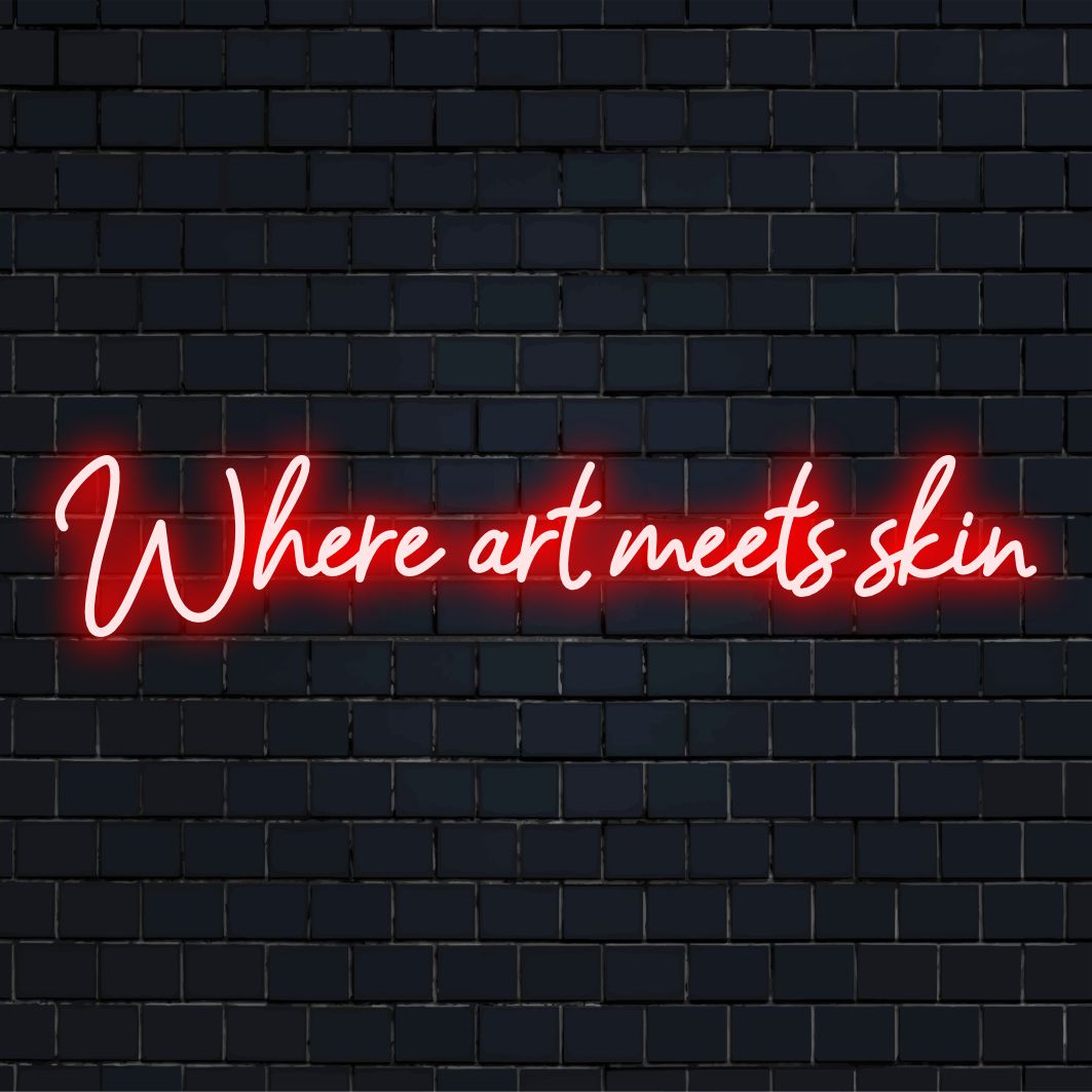 Letreiro de neon LED vibrante com os dizeres Where Art Meets Skin (Onde a Arte Encontra a Pele) ��� uma obra-prima personalizada que mistura arte com decoração luminosa.