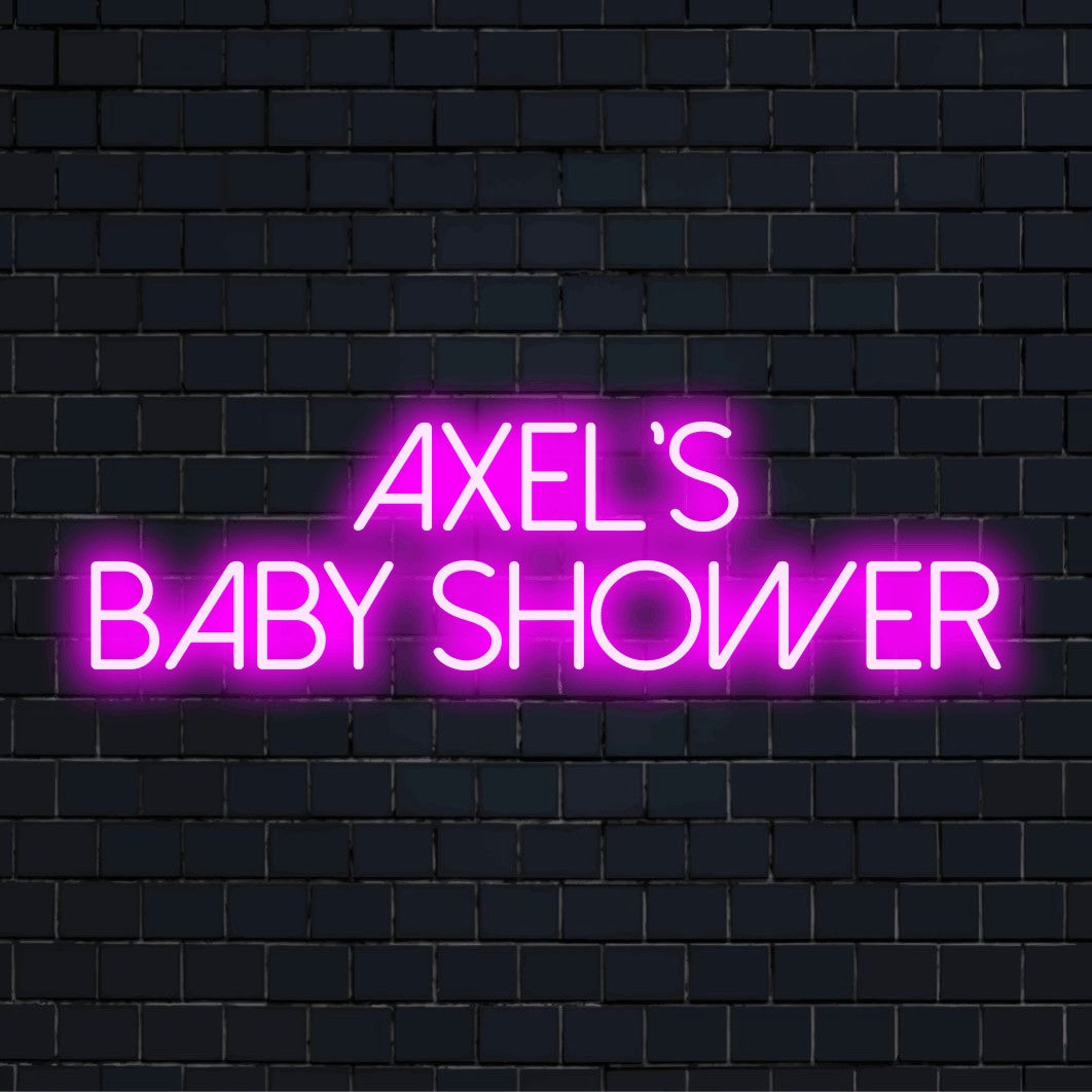 Axel_s Baby Shower Custom Name Neon Sign, neon text light against brick backdrop
