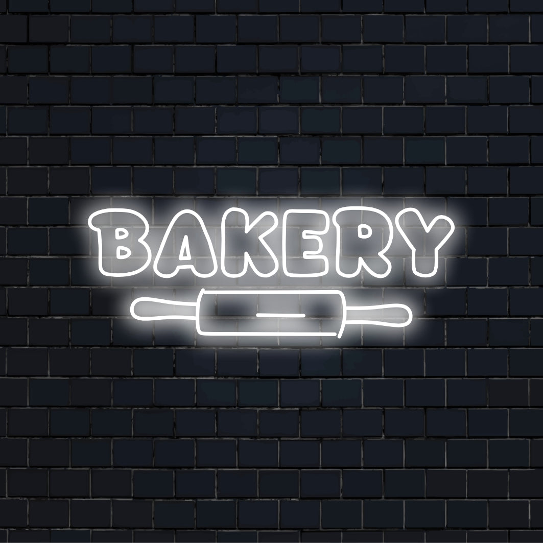 Bakery Neon Light with soft neon glow on dark brick background