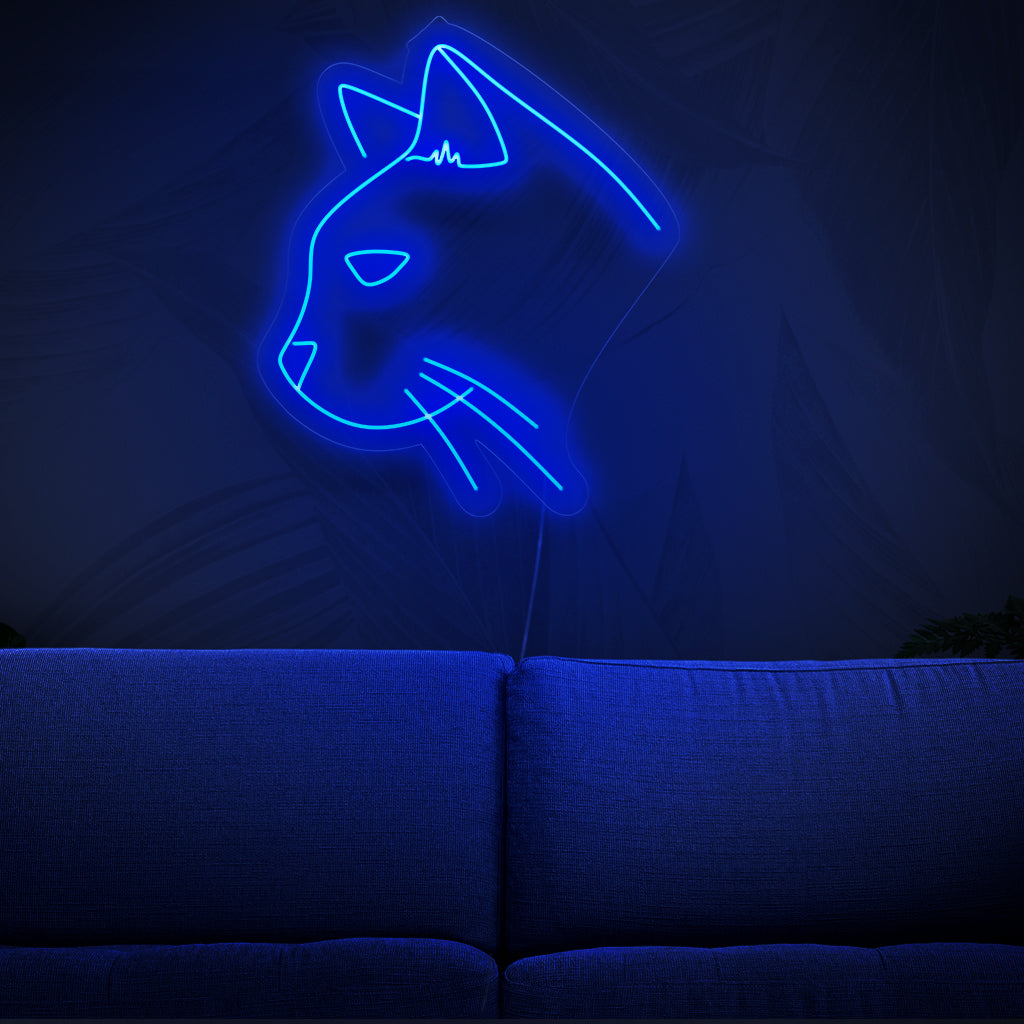 Um charmoso letreiro neon de gato, perfeito para decoração com tema animal, emanando uma luz vibrante e cativante.