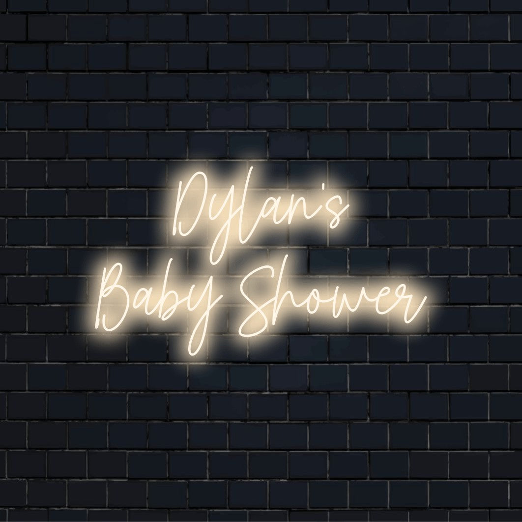Dylan_s Baby Shower Custom Name Neon Sign, glowing wall decor on black brick background