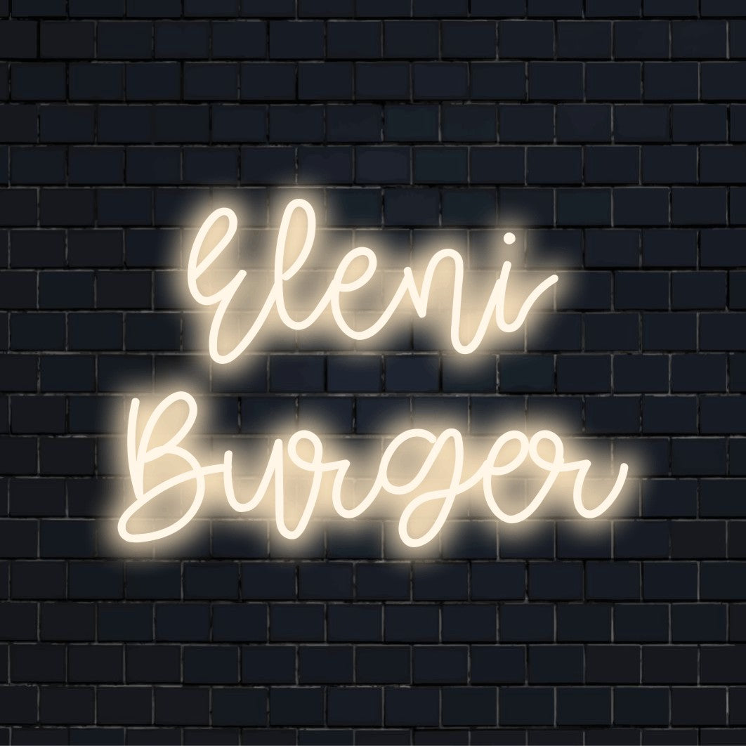 Eleni Burger Custom Name Neon Sign, glowing neon text against black brick wall