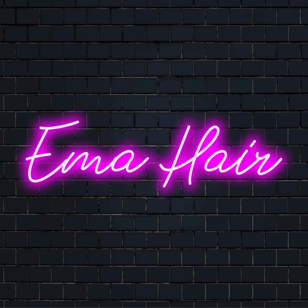 Ema Hair Personalized Neon Light with soft neon glow on dark brick wall