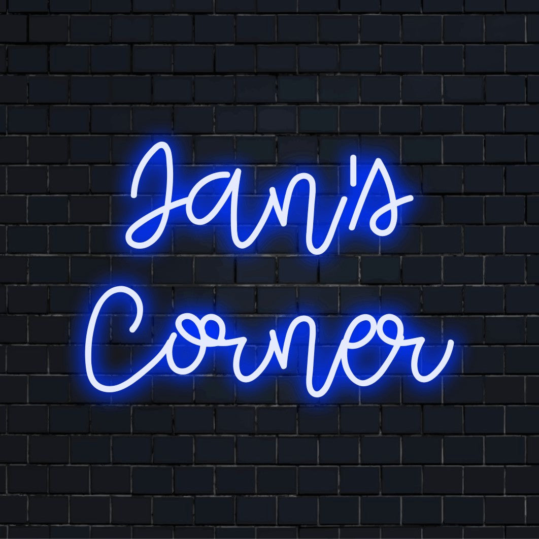 Jan_s Corner Personalized LED Neon Sign, bright neon glow against black brick wall