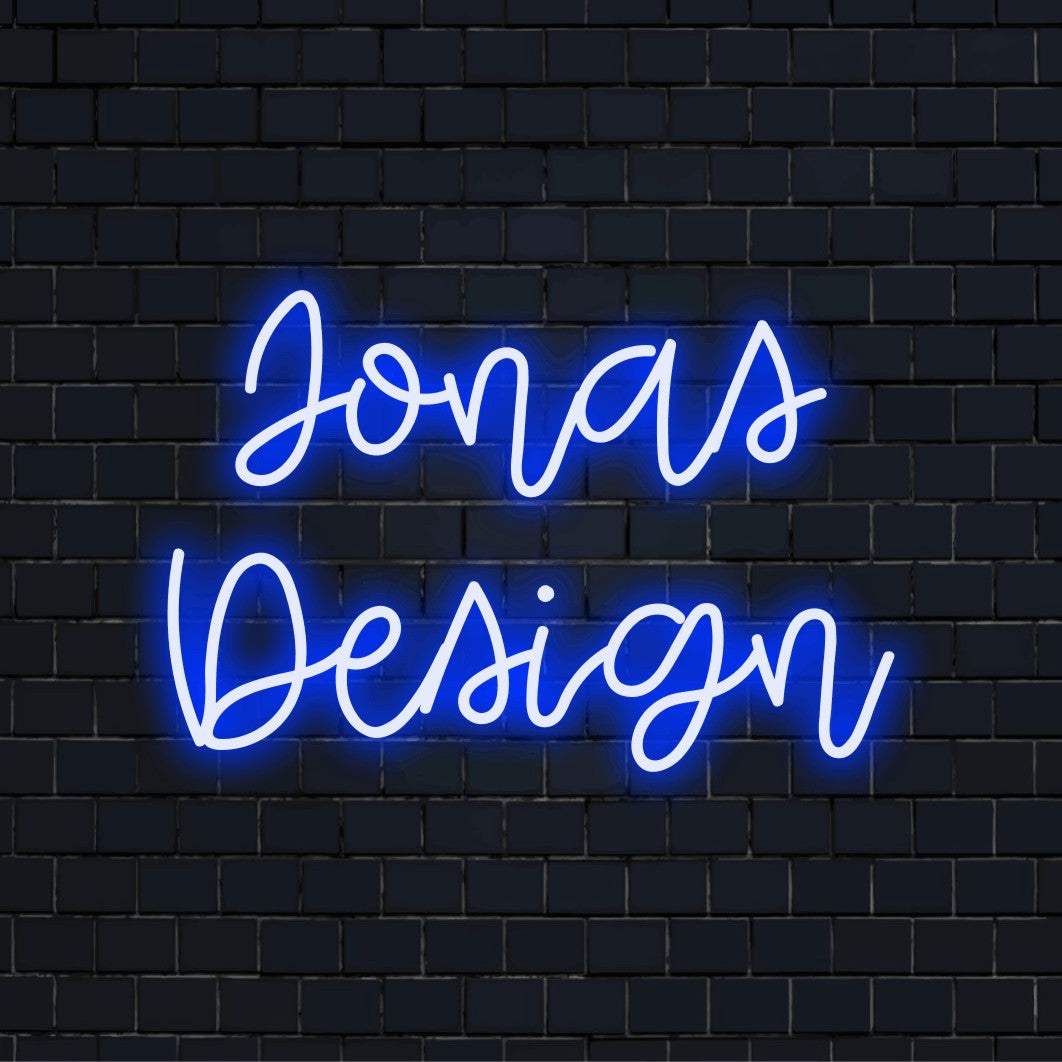 Jonas Design Custom Name Neon Sign, bright neon lettering on dark brick background