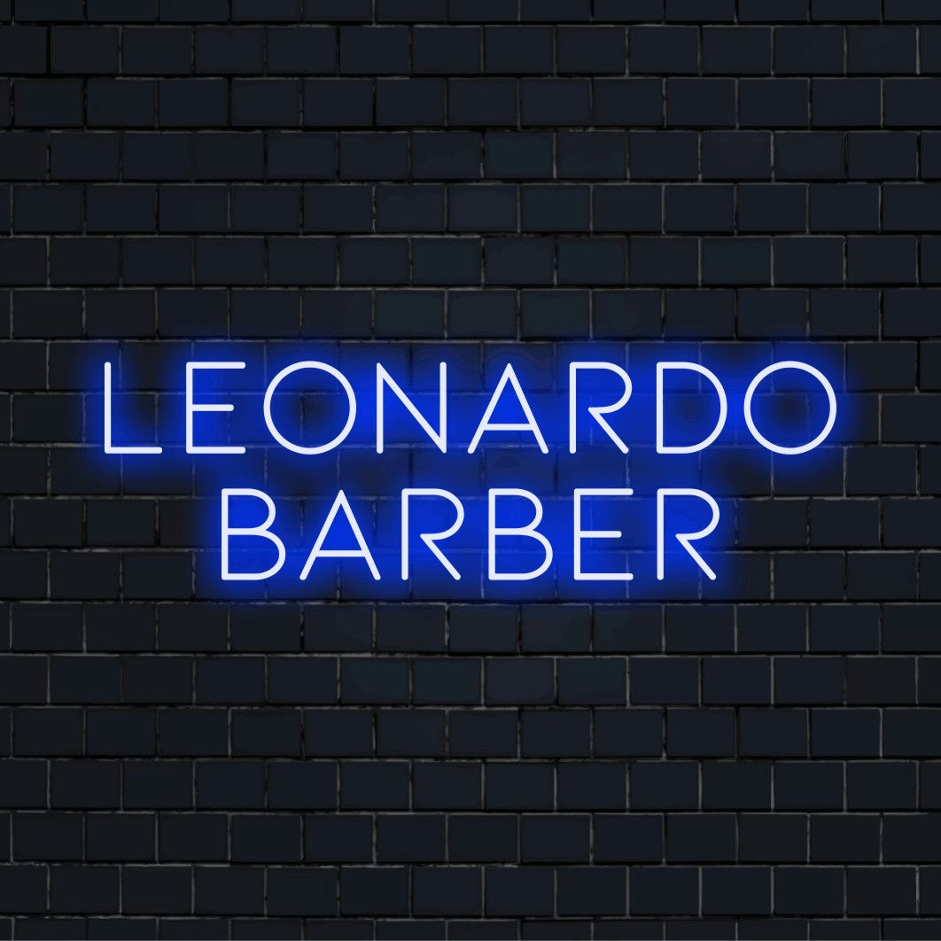 Leonardo Barber Personalized LED Neon Sign, soft neon glow on dark brick wall
