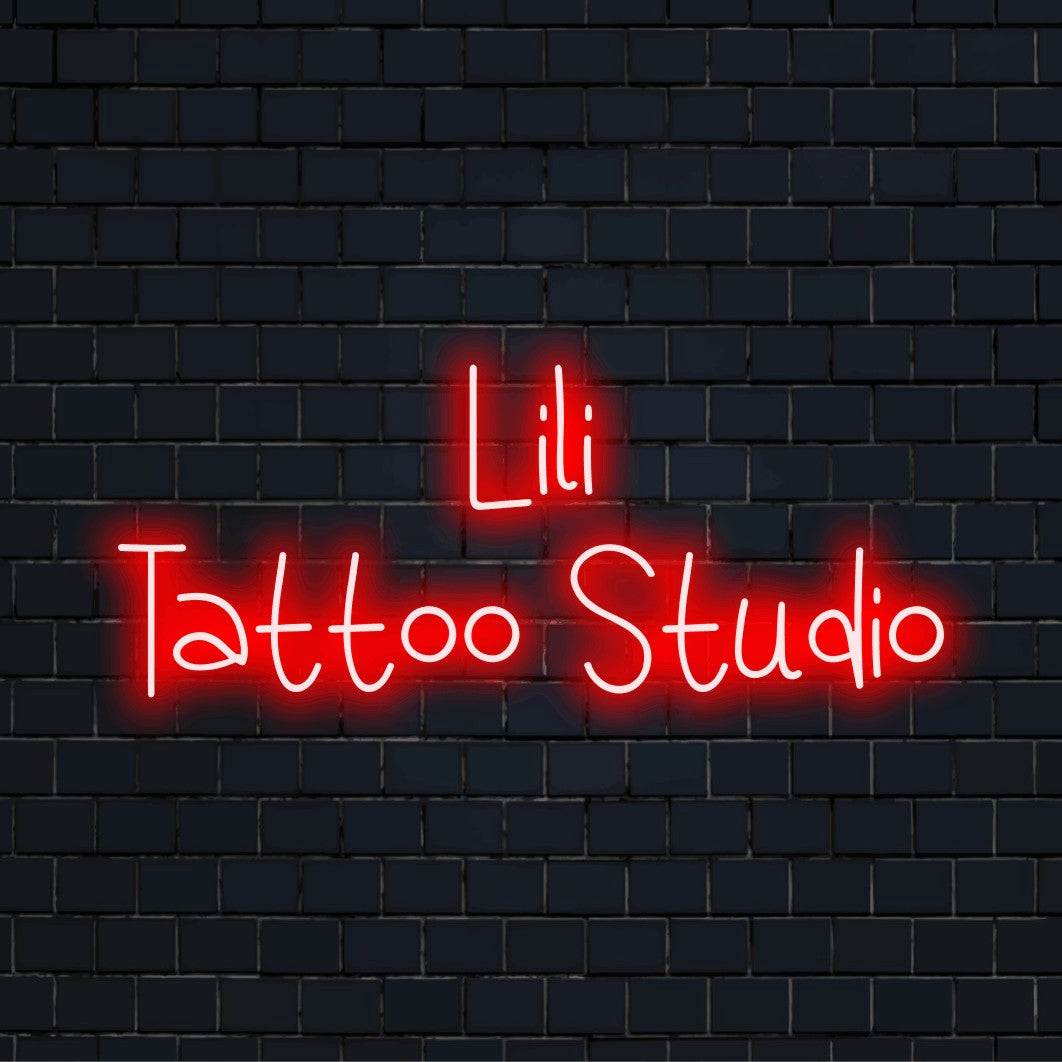 Lili Tattoo Studio Personalized LED Neon Sign, bright LED glow on dark brick background