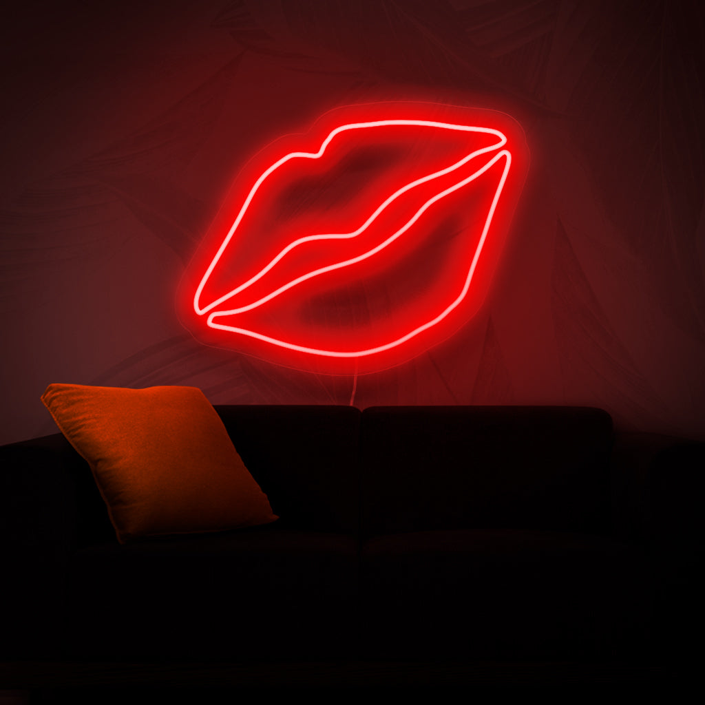 Um letreiro de neon com lábios ousados, que adiciona um toque de beleza e glamour a qualquer espaço com sua luz vibrante e cativante.
