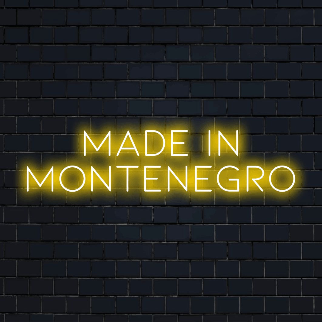 Made In Montenegro Neon Light with neon text light against brick backdrop