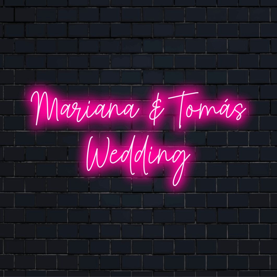 Mariana _ Tomas Wedding Personalized Neon Light with bright LED glow on dark brick wall