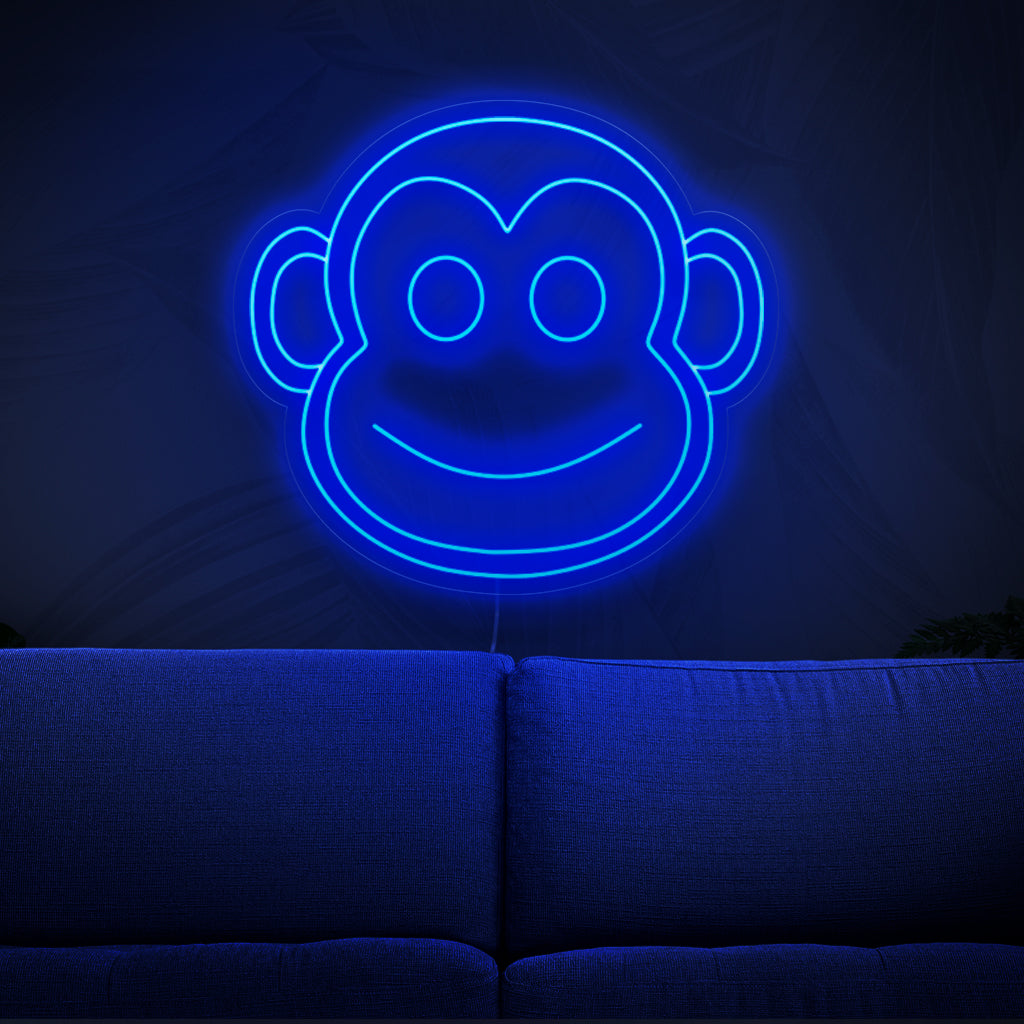 O letreiro de neon em forma de macaco é um complemento divertido para uma decoração com tema animal, emanando uma luz viva e energética.
