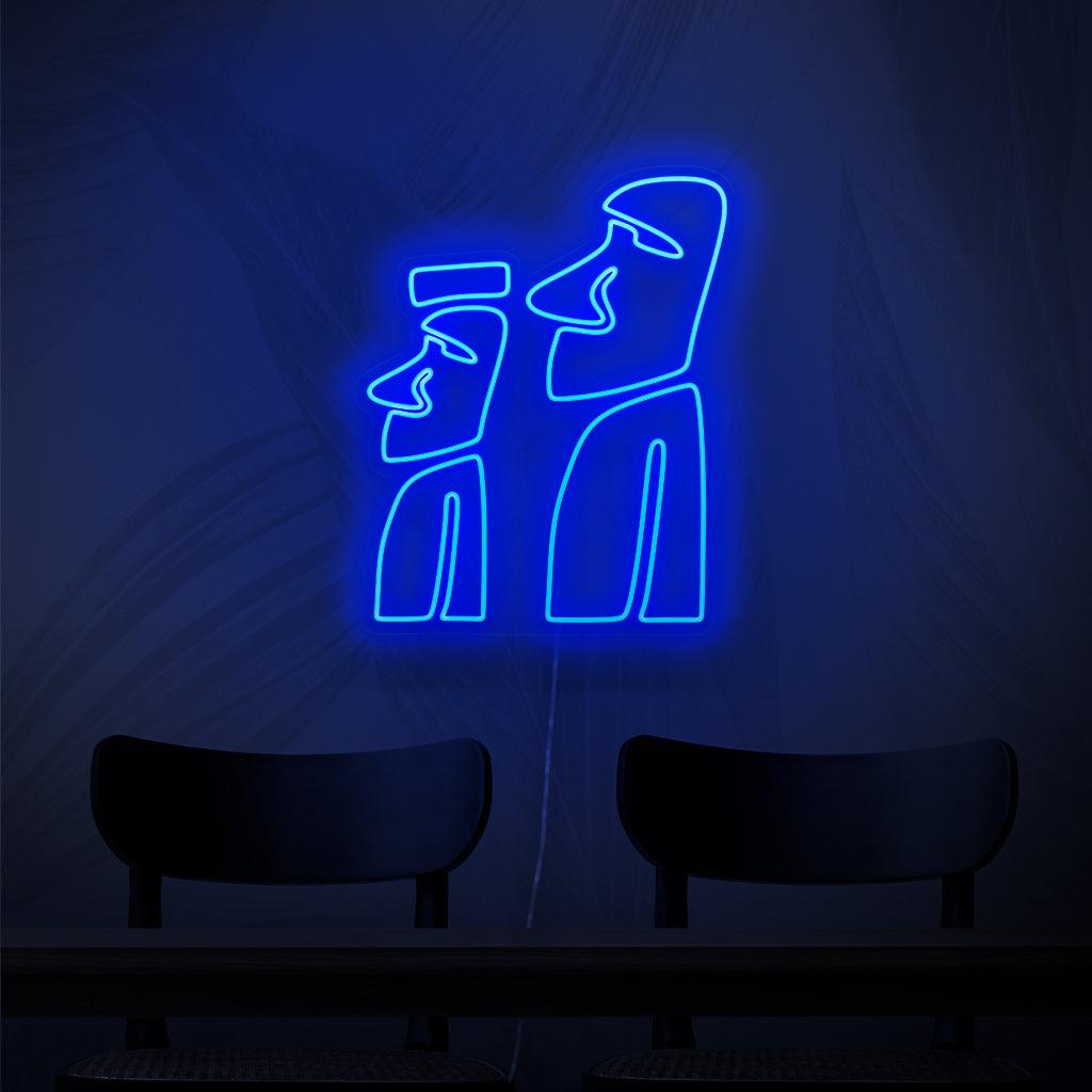 Um letreiro de neon encantador com os Monumentos Moai, estátuas de pedra icônicas da Ilha de Páscoa.