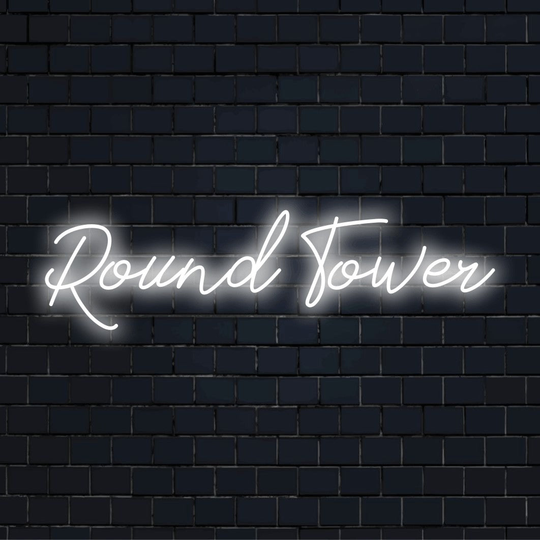 Round Tower Neon Sign, soft neon glow on dark brick wall