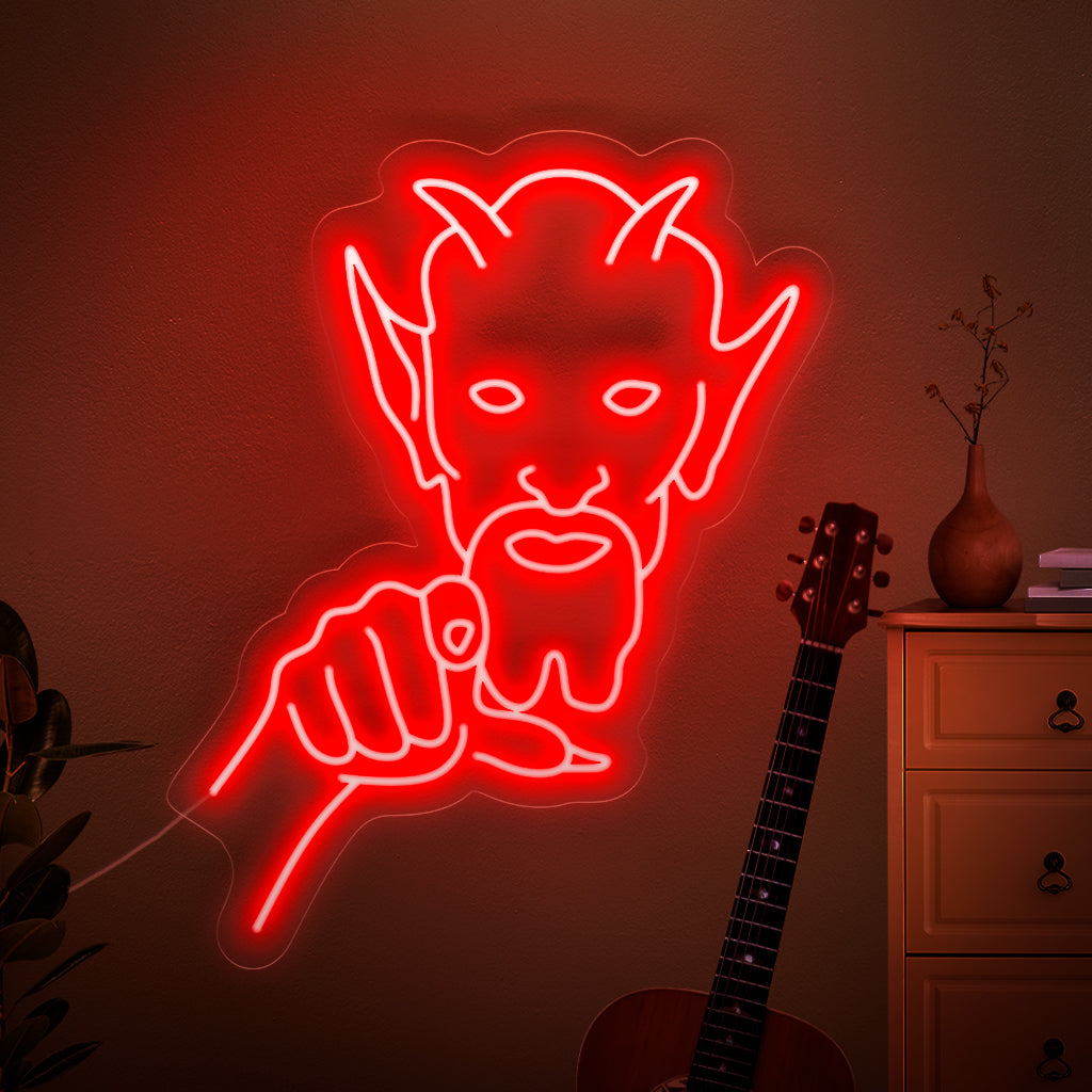 Um letreiro de neon assustador com um demônio ameaçador apontando diretamente para você, criando uma sensação de medo e desconforto.
