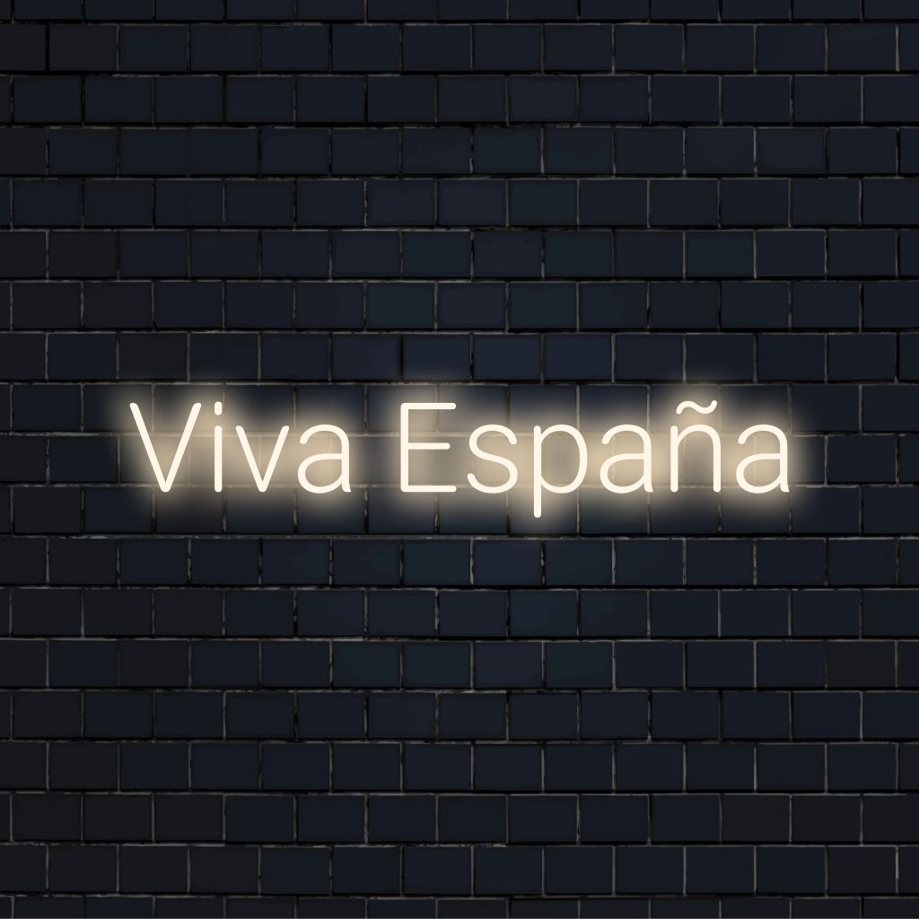 Viva Espana Neon Sign, bright LED glow against brick backdrop