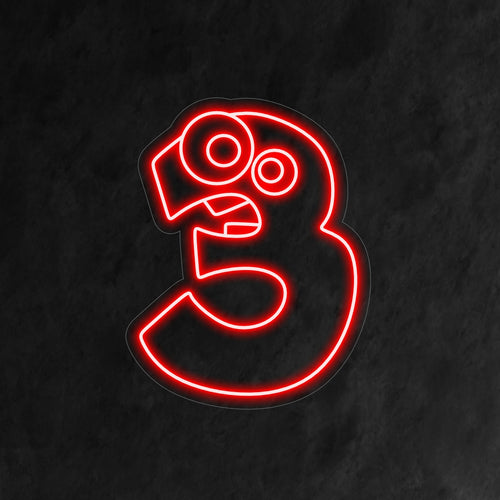 "Placa de neon para 3º aniversário" apresenta um número 3 fofo e cômico, com olhos e dentes caricaturados, dando um toque encantador à comemoração do terceiro aniversário de uma criança.