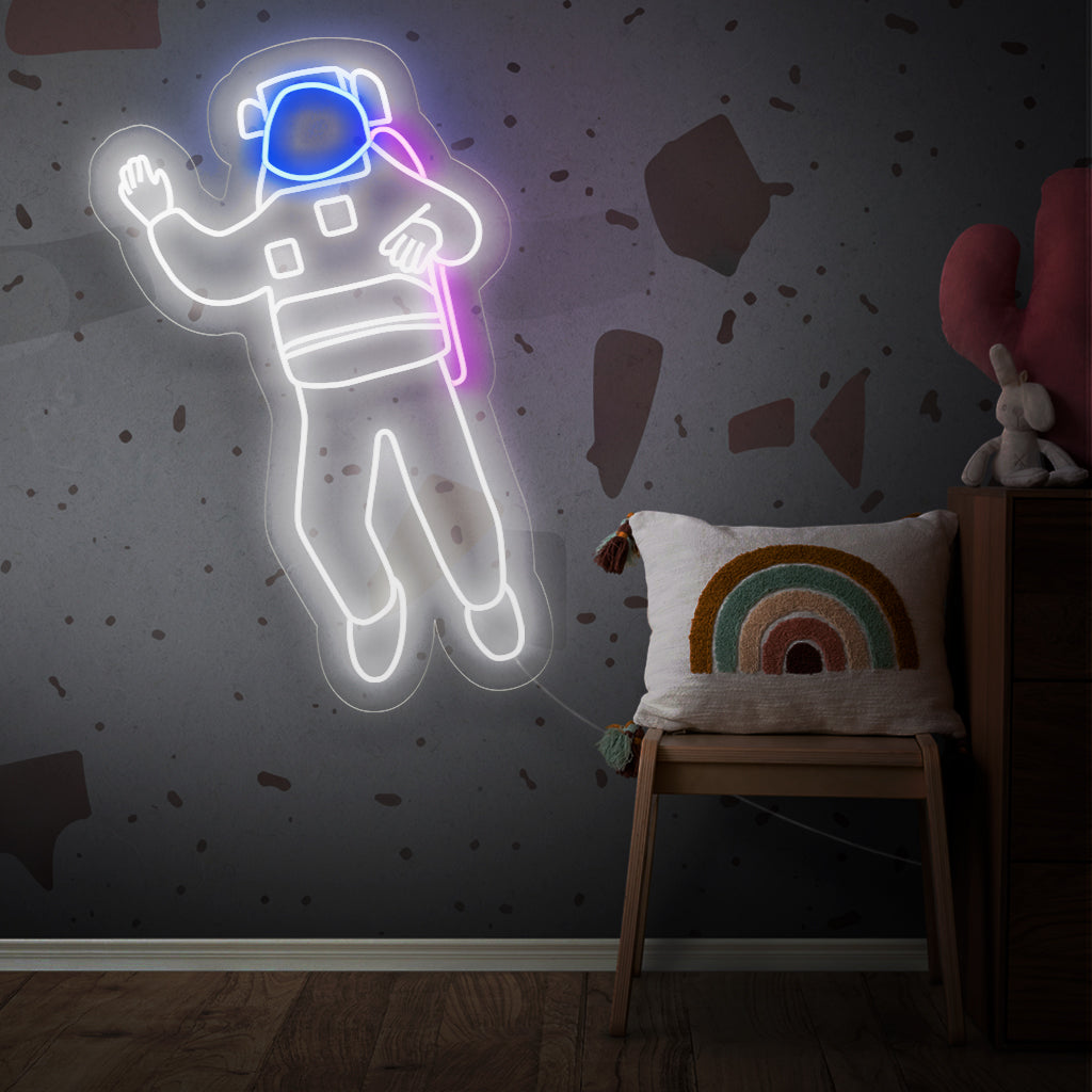 "Placa de neon de astronauta" - Uma luz neon cósmica com a representação icônica de um astronauta, infundindo maravilhas interestelares e uma sensação de exploração no seu espaço de vida.