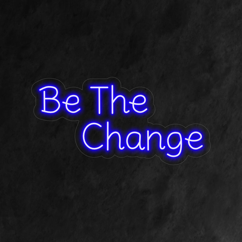 "Seja a Mudança": Uma poderosa luz neon com uma mensagem inspiradora, trazendo positividade e poder ao seu ambiente.