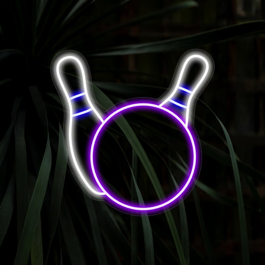 "Bowling Ball and Pins Neon Sign" captures the excitement of recreation with a dynamic illustration of a bowling ball striking the pins. This sports-themed neon light is a striking addition to your decor, perfect for enthusiasts of the game.