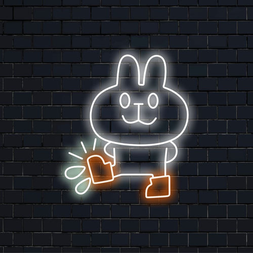 "Bunny in Boots Neon Sign" - A whimsical neon light featuring the playful image of a bunny wearing boots, infusing lightheartedness and a love for adorable creatures into your living space.