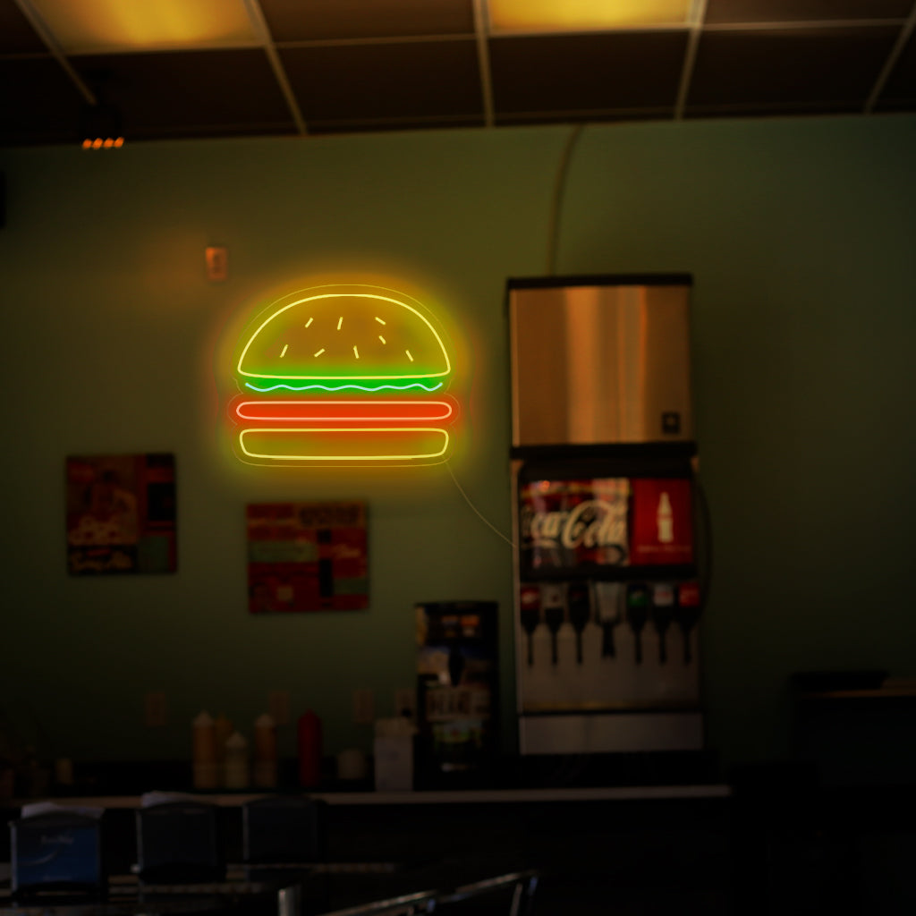 "Placa de néon de hambúrguer" - Uma luz de néon de dar água na boca com o símbolo icônico de um hambúrguer, trazendo uma atmosfera de delícias e amor pelos clássicos favoritos de fast-food para sua hamburgueria ou restaurante.