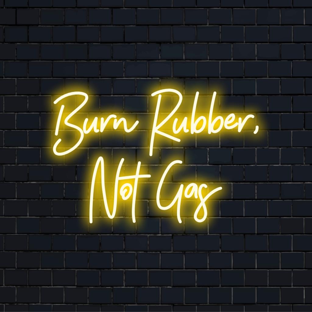 Custom LED Neon Sign: Burn Rubber, Not Gas in vibrant colors, ideal for adding personality and flair to any space.