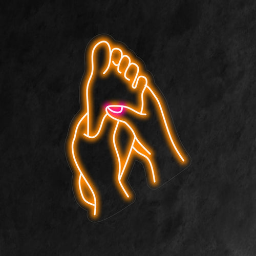 O letreiro de neon "Foot Massage" é uma adição relaxante e relaxante ao seu ambiente de bem-estar. Uma luz neon que convida você a relaxar e desfrutar de uma massagem nos pés.