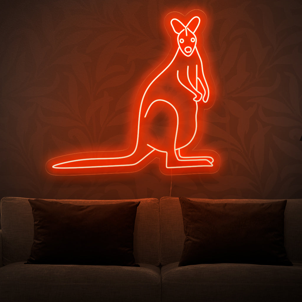 "Placa de neon de canguru" - Inunde seu espaço com uma energia lúdica usando esta placa de neon, exibindo um canguru alegre em cores vibrantes. Perfeito para espaços que celebram a alegria e a vivacidade.