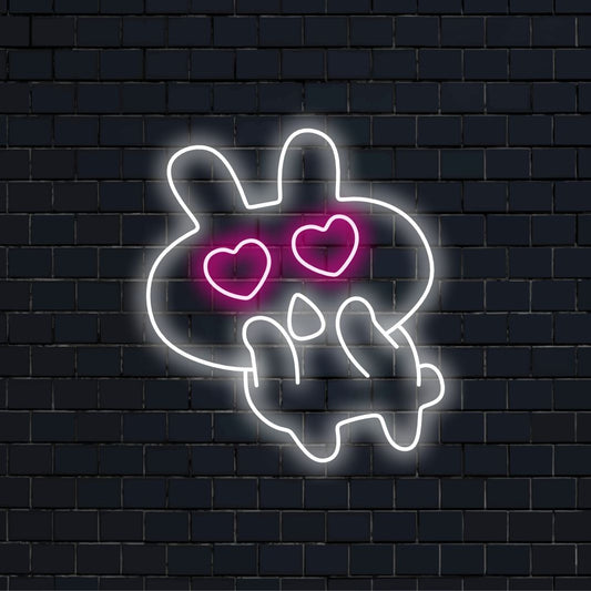 "Placa de Neon de Coelhinho Apaixonado" é um toque adorável e charmoso para espaços cheios de capricho e amor. Ilumine com um charme inspirado em coelhinhos!
