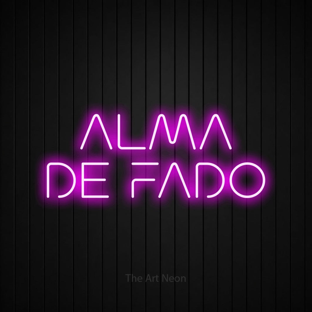 LED neon sign reading “ALMA DE FADO”, arranged in 2 lines.