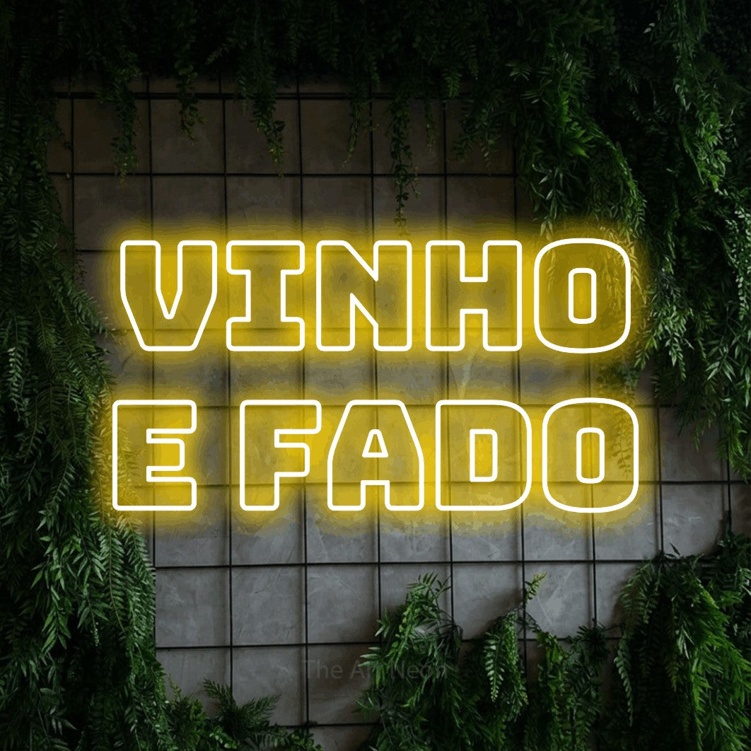 LED neon sign reading “VINHO e fado”, arranged in 2 lines.