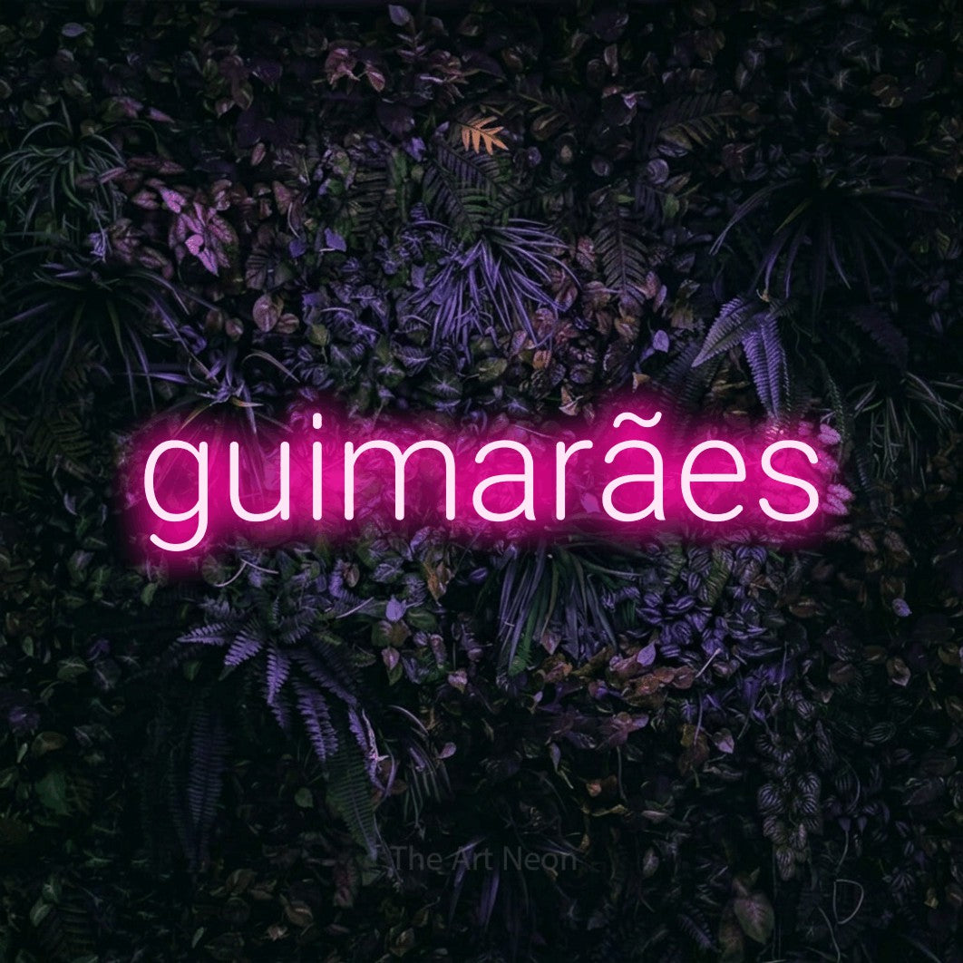 LED neon sign reading “guimarães”, arranged in a single line.