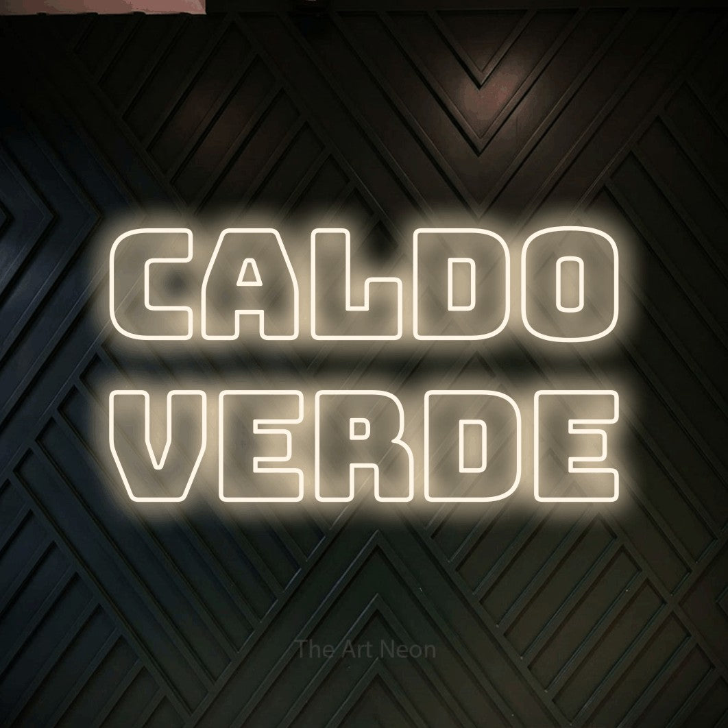 LED neon sign reading “CALDO verde”, arranged in 2 lines.